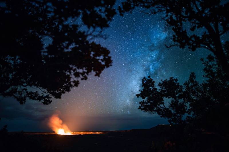 photo: nighttime view of volcano crater on the Big Island of Hawaii. Bike tour in Hawaii.